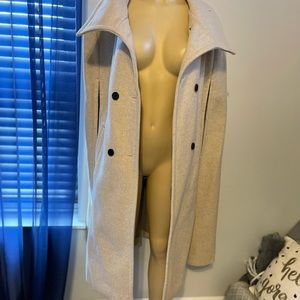 New Beige wool Cape size Large, runs extremely big. Can fit up to a 3X
